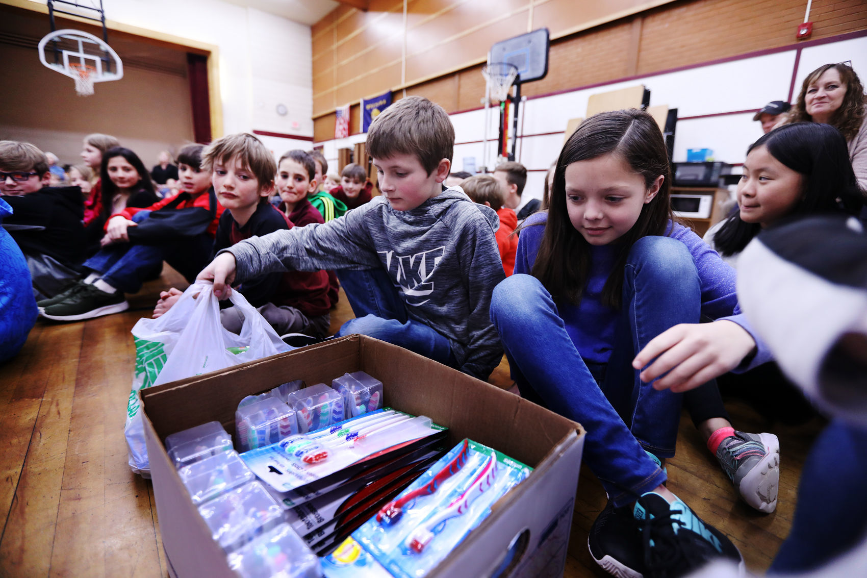 Butte Central students donate toothbrushes to local dentist